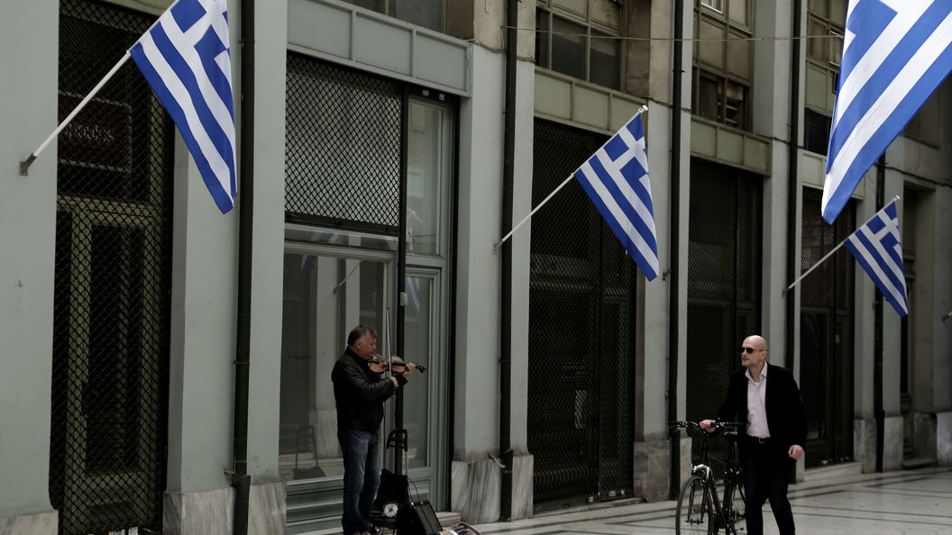 Еврогруппа достигла предварительной договоренности о новом транше помощи Греции