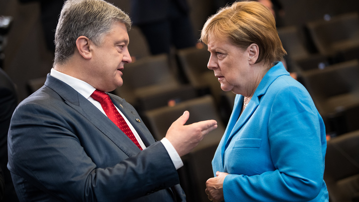 Меркель проинформировала Порошенко об итогах переговоров с Путиным