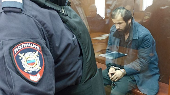 Вели жёстко - сразу в зал: В суд привезли ещё одного террориста из Крокуса