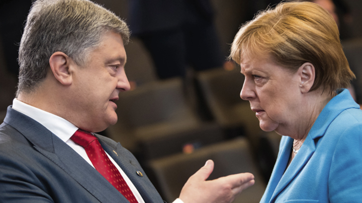 «Белые розы» Порошенко не впечатлили Меркель