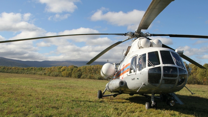 Первые фото с места крушения Ан-26: Спасатели несколько часов добирались до места